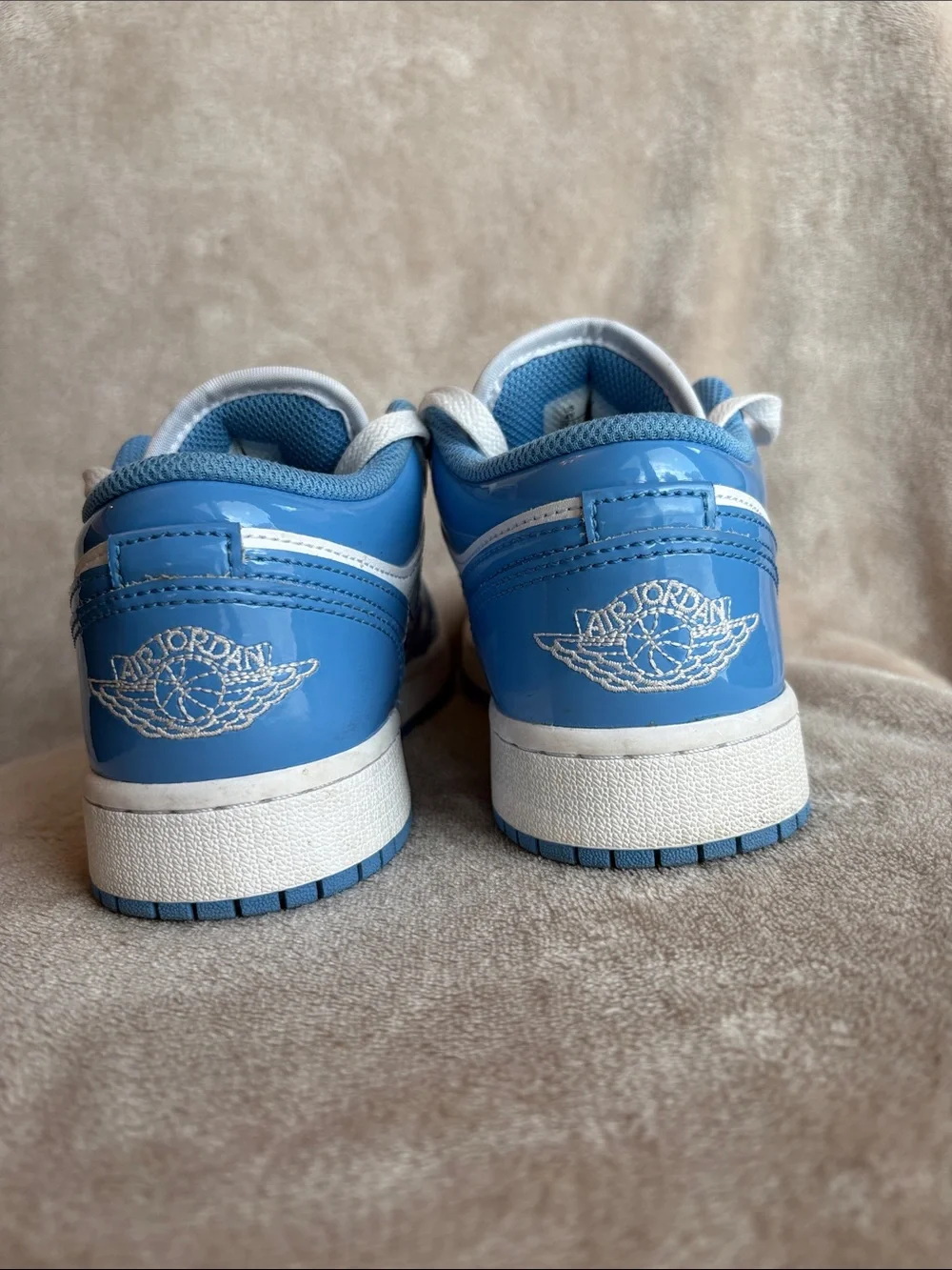 Nike Air Jordan 1 Low Boys Sneakers in University Blue and White